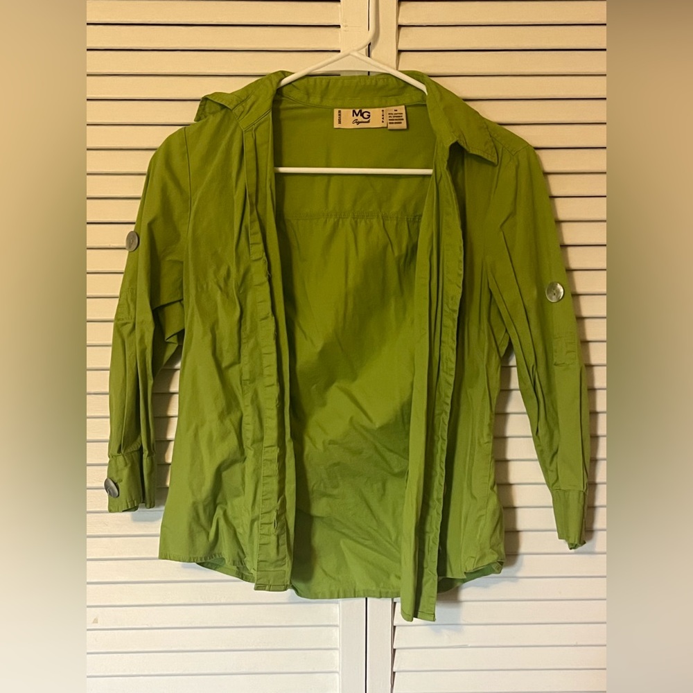 Lime green 3 quarter sleeved button down shirt features reflective buttons